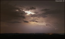 Orage faiblissant laissant entrevoir un dernier éclair inter-nuageux en Béarn - 01h13